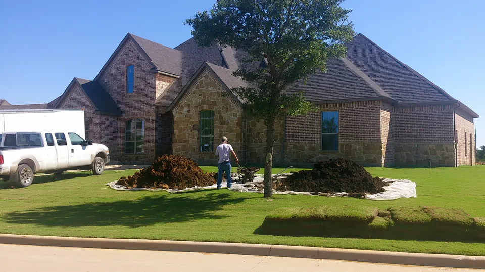 A foundation repair crew placing piers at the corner of a newer brick home in Prosper on a visit scheduled from McKinney.